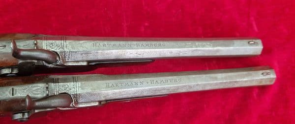 A fine pair of German .58 calibre  percussion target pistols by Hartmann Hamburg. C. 1840. Ref 4334.