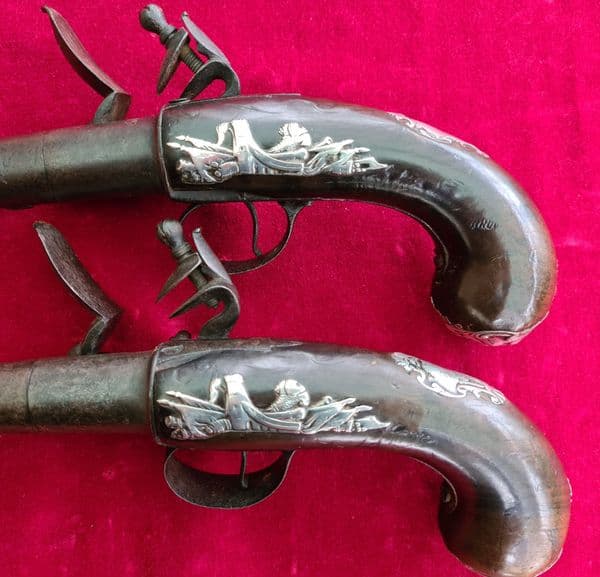 A fine pair of  Queen Anne silver mounted flintlock pistols by HAWKS of OXFORD. C.1760. Ref 3732.