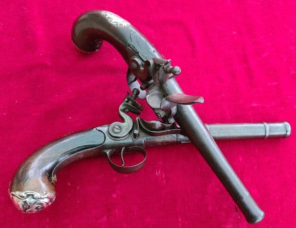 A fine pair of  Queen Anne silver mounted flintlock pistols by HAWKS of OXFORD. C.1760. Ref 3732.