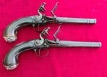 A fine pair of Queen Anne silver mounted flintlock pistols by HAWKS of OXFORD. C.1760. Ref 3732.
