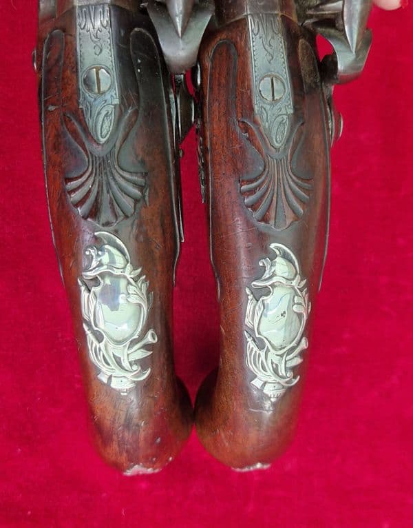 A rare pair of English silver mounted flintlock pistols by COLLUMBELL. Circa 1735-1765. Ref 4165.
