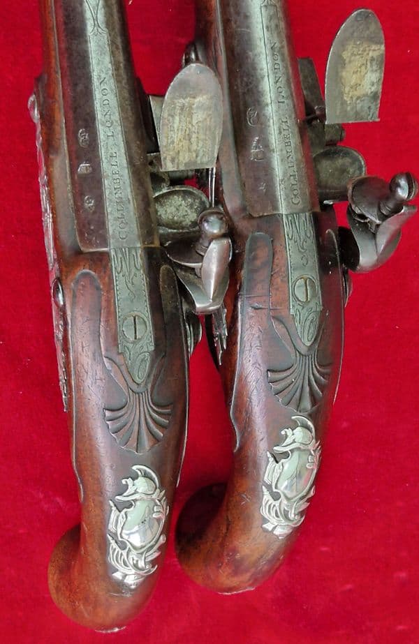 A rare pair of English silver mounted flintlock pistols by COLLUMBELL. Circa 1735-1765. Ref 4165.