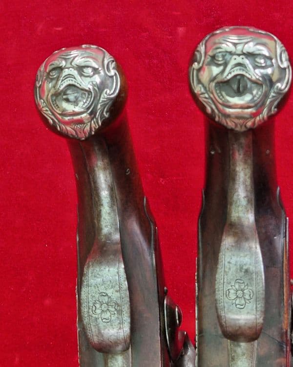 A rare pair of English silver mounted flintlock pistols by COLLUMBELL. Circa 1735-1765. Ref 4165.