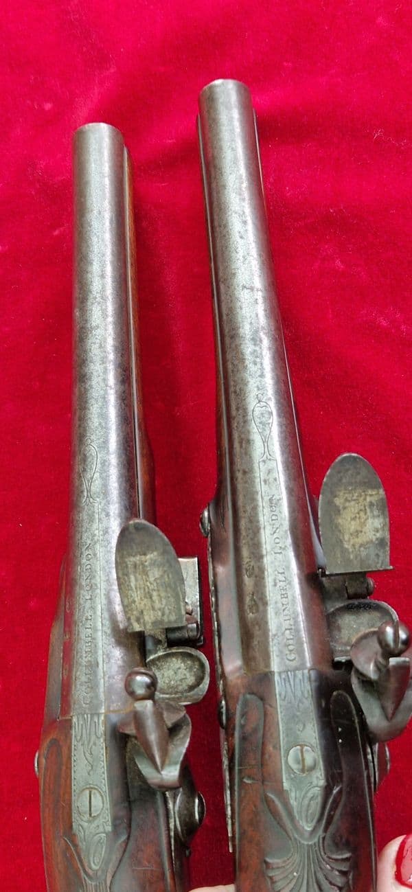 A rare pair of English silver mounted flintlock pistols by COLLUMBELL. Circa 1735-1765. Ref 4165.