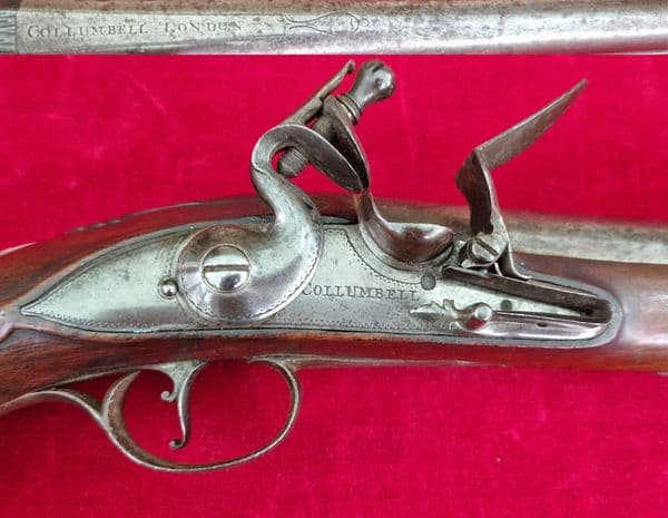 A rare pair of English silver mounted flintlock pistols by COLLUMBELL. Circa 1735-1765. Ref 4165.