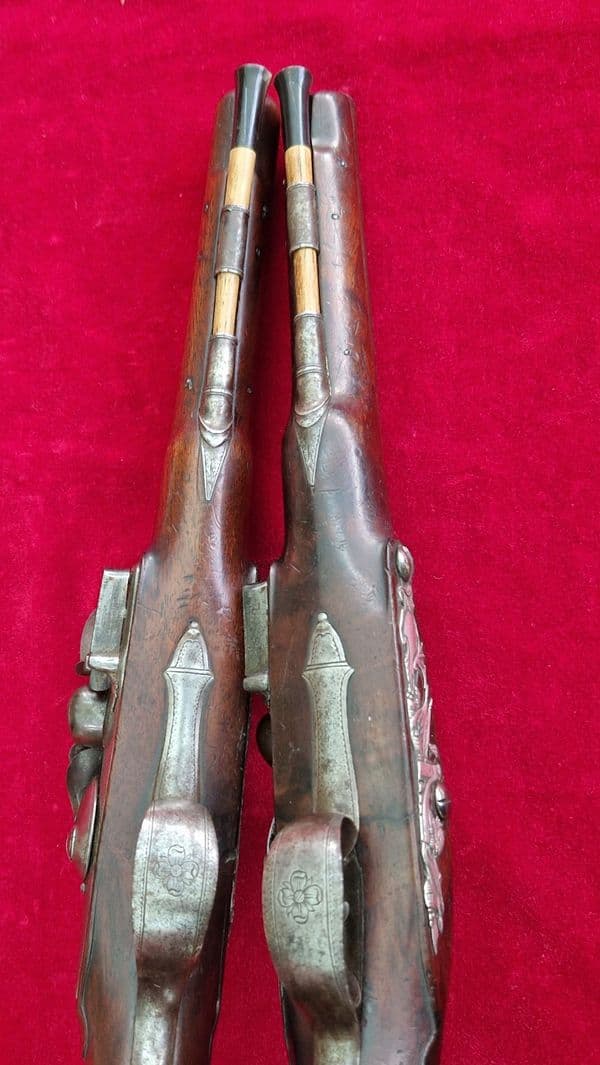 A rare pair of English silver mounted flintlock pistols by COLLUMBELL. Circa 1735-1765. Ref 4165.
