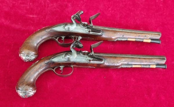 A rare pair of English silver mounted flintlock pistols by COLLUMBELL. Circa 1735-1765. Ref 4165.