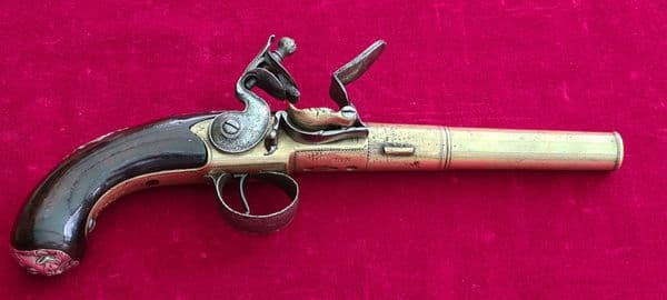 A rare Queen Anne style brass framed Silver mounted Flintlock pistol by HEYLIN LONDON. Ref 4029.