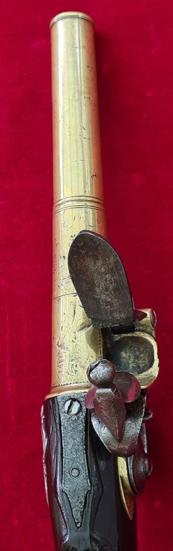 A rare Queen Anne style brass framed Silver mounted Flintlock pistol by HEYLIN LONDON. Ref 4029.