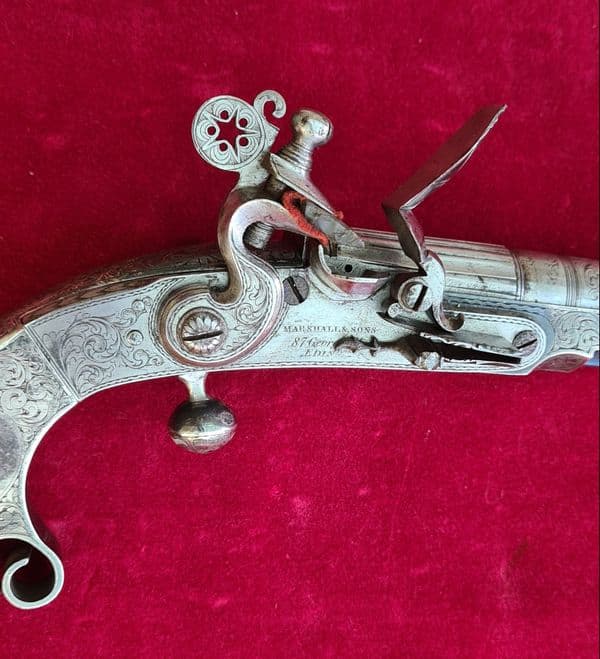 A rare Scottish Highlander's metal flintlock pistol. Made by MARSHALL  of EDINBURGH. Ref 3421.