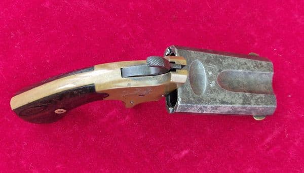 A scarce American .41 calibre double Barrelled rim-fire pistol, Circa 1870. Good condition. Ref 4261