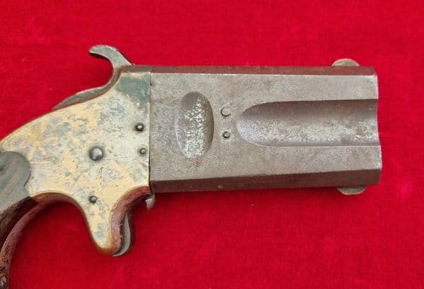 A scarce  double barrelled American Arms Co .41 rimfire Derringer. Circa 1866-1878. Ref 4240.