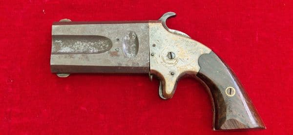 A scarce  double barrelled American Arms Co .41 rimfire Derringer. Circa 1866-1878. Ref 4240.