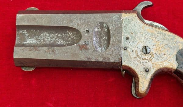 A scarce  double barrelled American Arms Co .41 rimfire Derringer. Circa 1866-1878. Ref 4240.