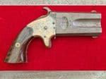 A scarce double barrelled American Arms Co .41 rimfire Derringer. Circa 1866-1878. Ref 4240.