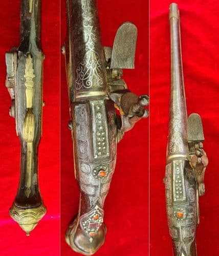 A scarce Turkish Flintlock pistol with embossed Silver decoration.  Ref 3325
