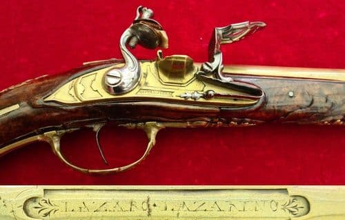 A Superb and very long ITALIAN single barrel flintlock pistol manufactured by GIOVANI POETA Ref 3730