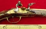 A Superb and very long ITALIAN single barrel flintlock pistol manufactured by GIOVANI POETA Ref 3730