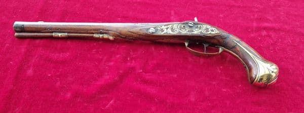 A very long German single shot percussion pistol made by DAVNER of BIBERACH. C. 1720-1750. Ref 3885.