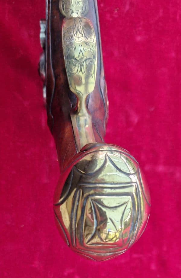 A very long German single shot percussion pistol made by DAVNER of BIBERACH. C. 1720-1750. Ref 3885.