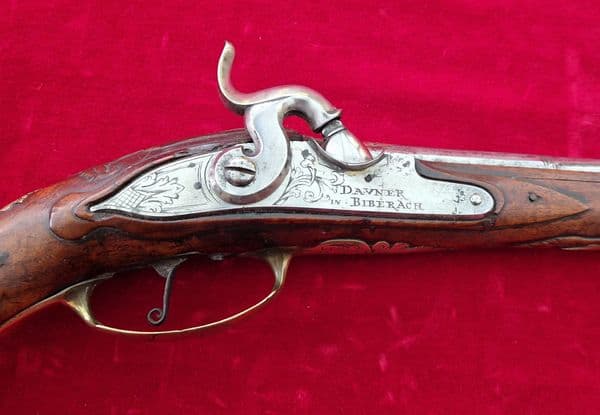 A very long German single shot percussion pistol made by DAVNER of BIBERACH. C. 1720-1750. Ref 3885.