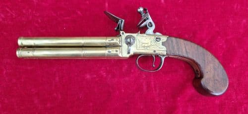 A very rare brass mounted four Barrelled Tap Action Flintlock Pistol by REA London. Ref 4486.