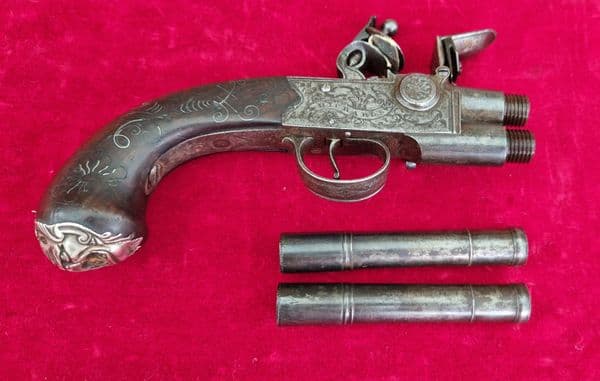 An English Queen Anne silver mounted double barrel flintlock pistol by Richards circa 1760. Ref 4409