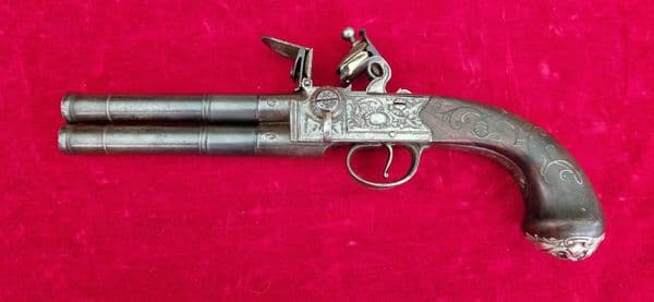 An English Queen Anne silver mounted double barrel flintlock pistol by Richards circa 1760. Ref 4409
