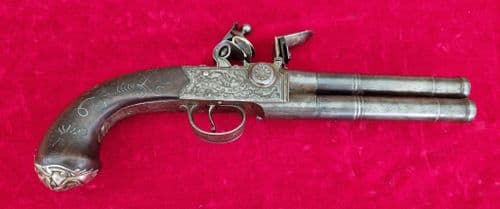 An English Queen Anne silver mounted double barrel flintlock pistol by Richards circa 1760. Ref 4409