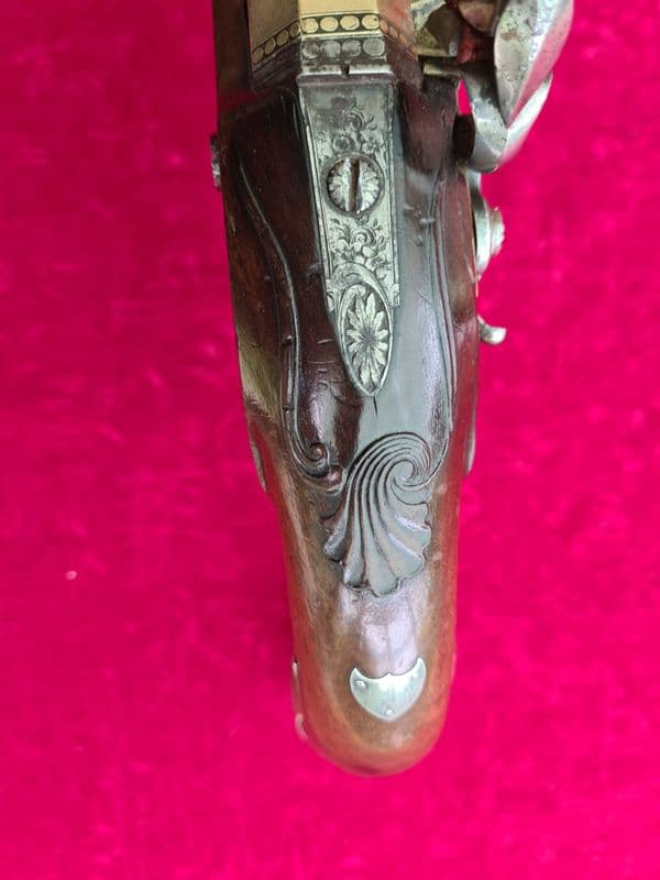 An exceptional 18 inch long brass barrel flintlock pistol by Knubley LONDON, C.1785-1799. Ref 3509
