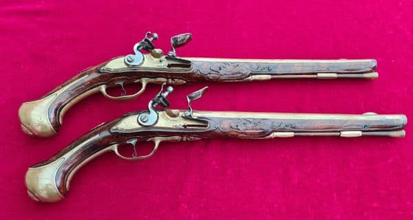 An extremely fine & very long pair of Liege Flintlock Pistols of high quality. Circa 1740. Ref 3927