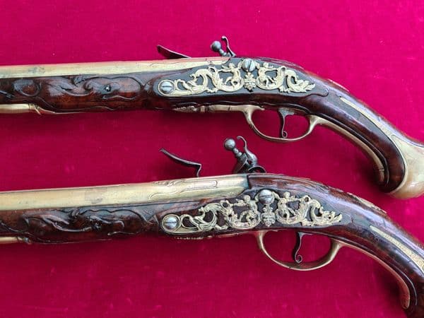 An extremely fine & very long pair of Liege Flintlock Pistols of high quality. Circa 1740. Ref 3927