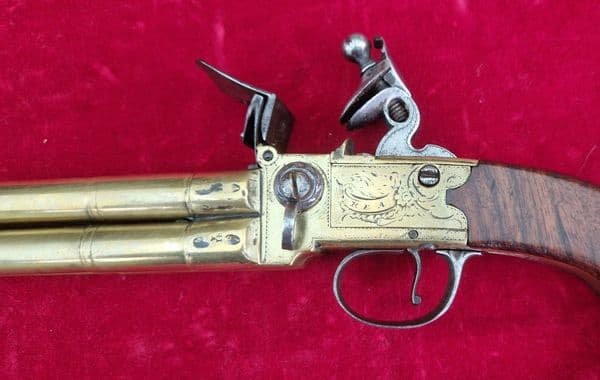 Brass mounted four Barrelled Tap Action Flintlock Pistol by REA London. Ref 4486. Was £4,350 now