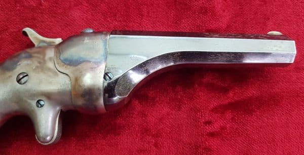 X X SOLD X X A HAMMOND BULLDOG single shot rimfire Derringer, retaining much finish. Ref 9851.