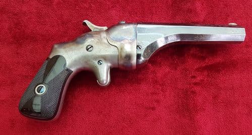 X X SOLD X X A HAMMOND BULLDOG single shot rimfire Derringer, retaining much finish. Ref 9851.