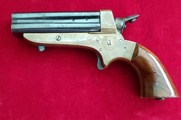 X X SOLD X X   Tipping & Lawden four barrelled rimfire derringer. C. 1865. Ref 2087.