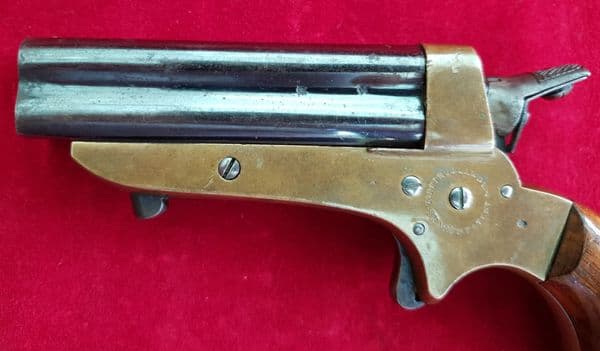 X X SOLD X X Tipping & Lawden four barrelled rimfire derringer. C. 1865. Ref 2087.