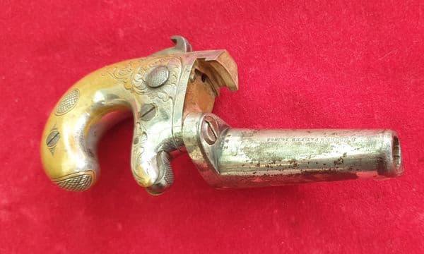 X X SOLD X X X  A  Moore's patent Derringer in .41 rim-fire calibre. C. 1860-1865. Ref 1486.