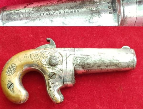 X X SOLD X X X A Moore's patent Derringer in .41 rim-fire calibre. C. 1860-1865. Ref 1486.