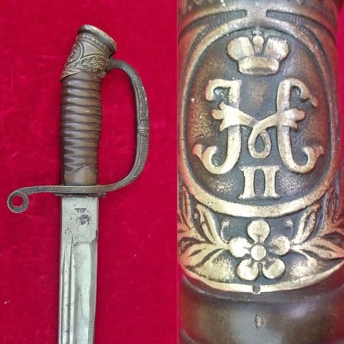 X X X  SOLD  X X X RUSSIAN  Military sword, in original brass mounted leather scabbard. Ref 4210