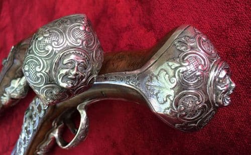 X X X SOLD A pair extremely long silver mounted percussion pistols. Excellent condition. Ref 8603.