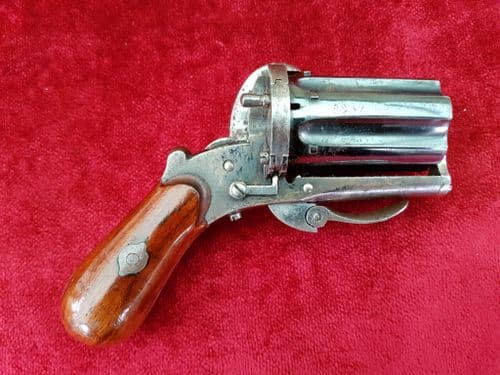 X X X SOLD X X A scarce 6 shot antique pin-fire pepper-box revolver retaining much original blued