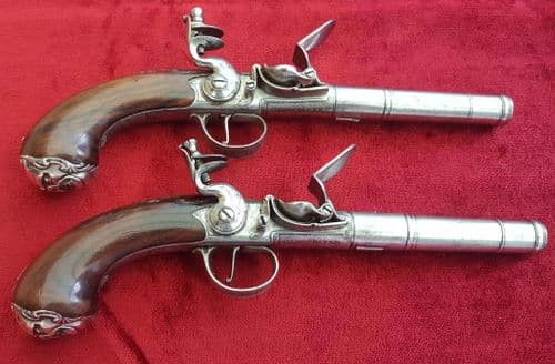 X X X SOLD X X Pair of Queen Anne silver mounted flintlock pistols by Godsall, C. 1777. Ref 9533.