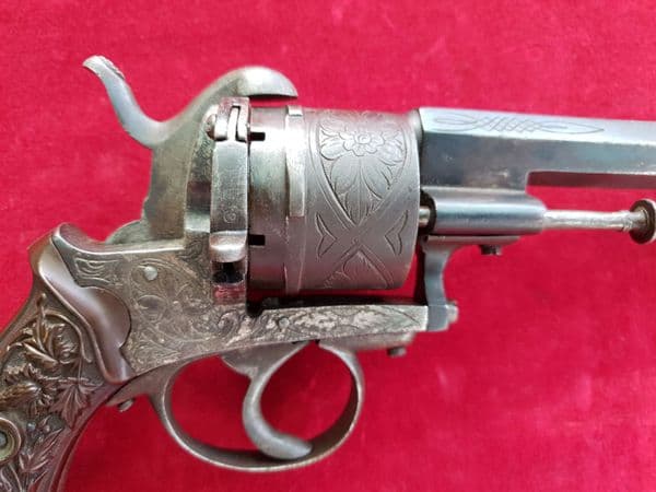 X X X  SOLD  X X X  6 shot double action  pin-fire revolver with embossed Lion grips. Ref 1608.