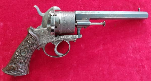 X X X  SOLD  X X X  6 shot double action  pin-fire revolver with embossed Lion grips. Ref 1608.