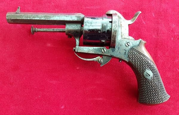 X  X X SOLD X X X  A  7 mm antique pin-fire revolver with folding trigger. Ref 1121.