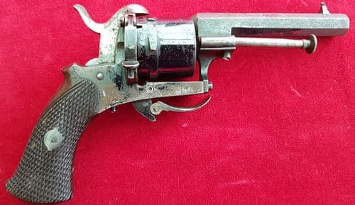 X  X X SOLD X X X  A  7 mm antique pin-fire revolver with folding trigger. Ref 1121.