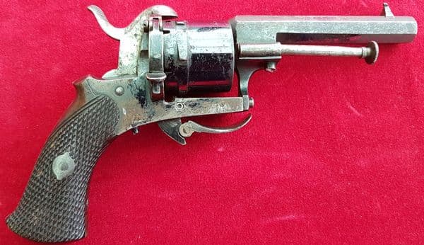 X X X SOLD X X X A 7 mm antique pin-fire revolver with folding trigger. Ref 1121.
