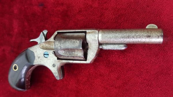 X X X  SOLD X X  X  A Colt .30 calibre obsolete rimfire revolver c. 1875.  Used condition. Ref 7472
