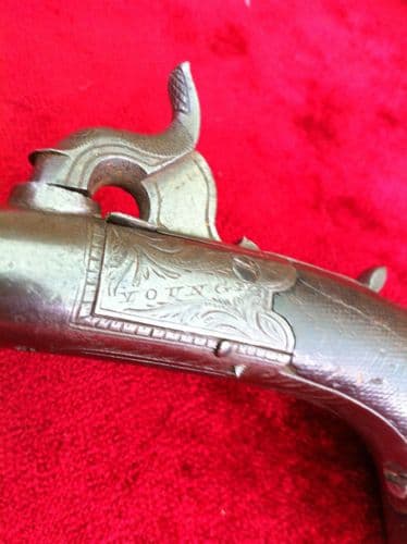X X X SOLD X X X A good English Percussion pocket pistol, the frame engraved with the makers name